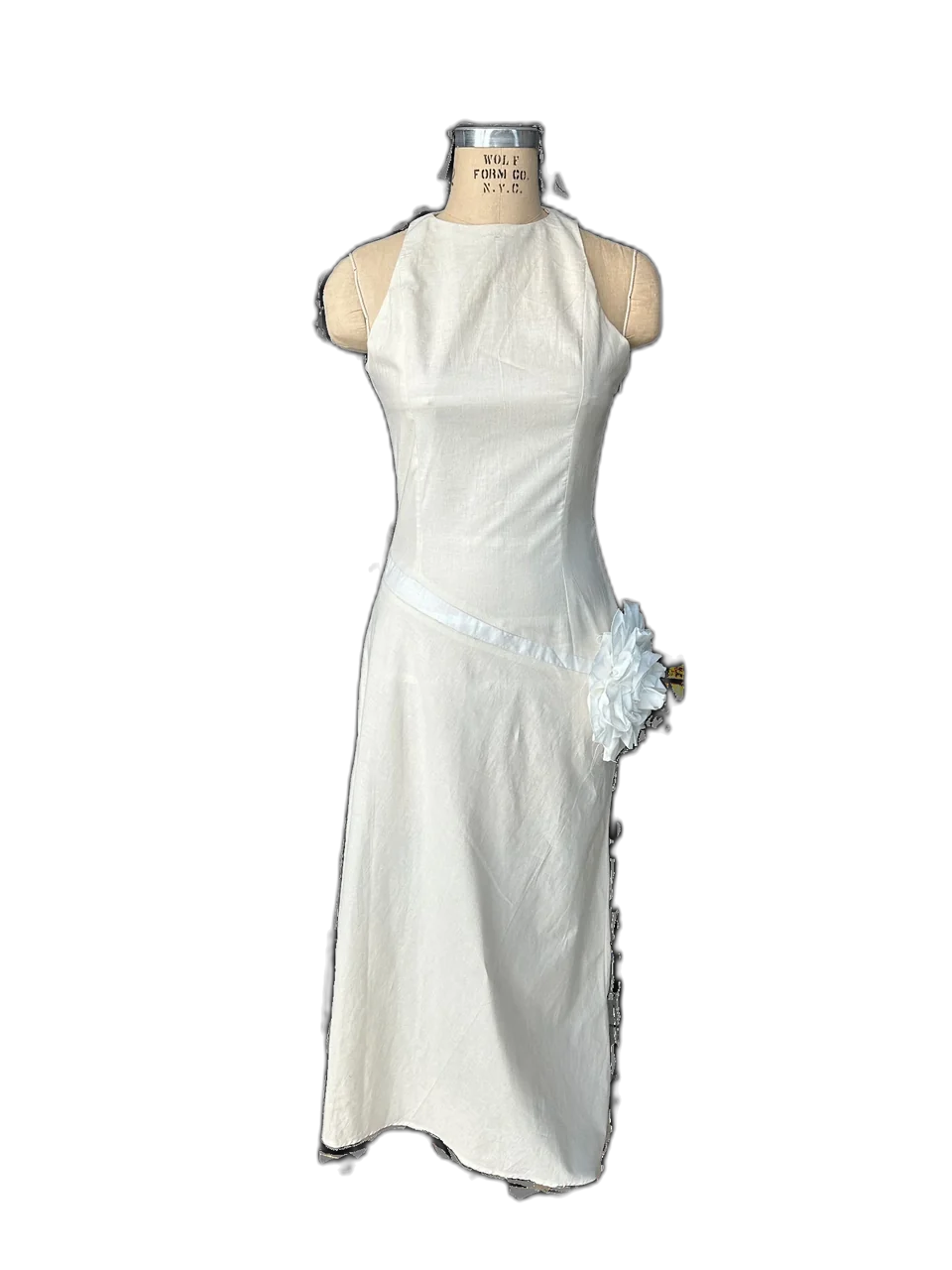 White Passion dress toile on a dress form, side view.